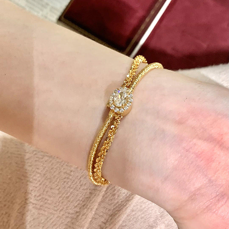 Wrapped gold wire bracelet