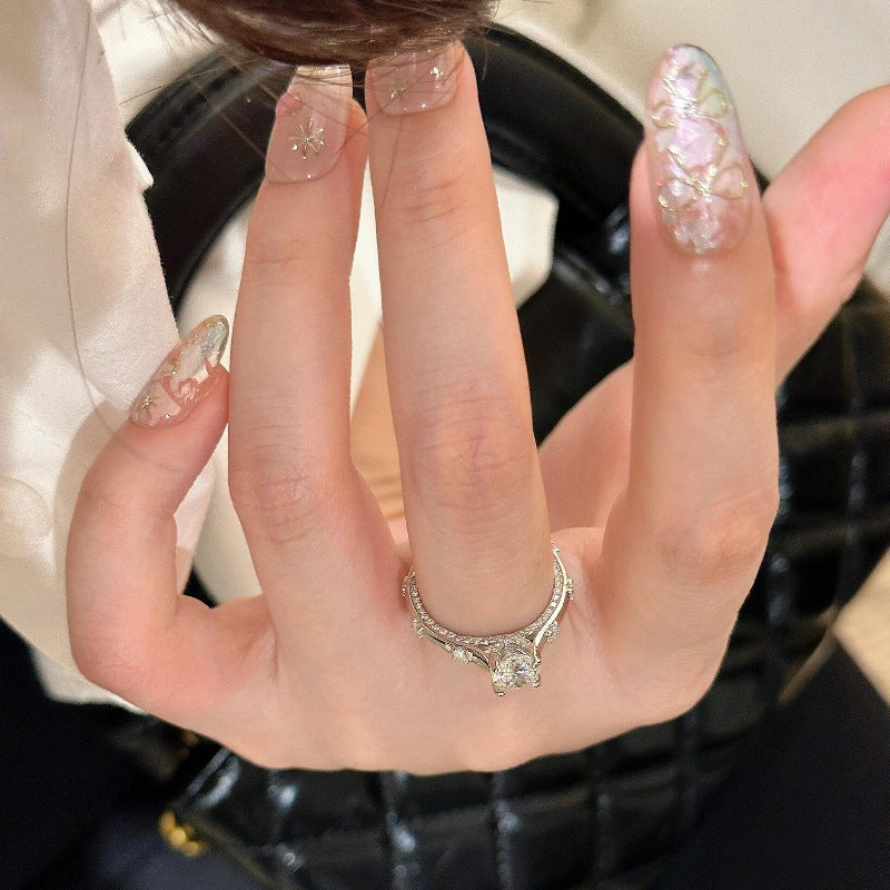 Four-claw moissanite and zircon ring