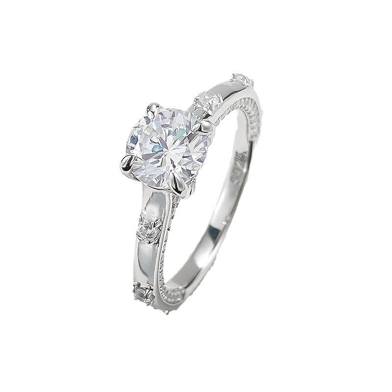 Four-claw moissanite and zircon ring
