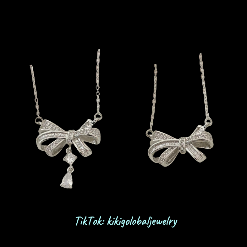 Sterling silver bow drop zircon necklace