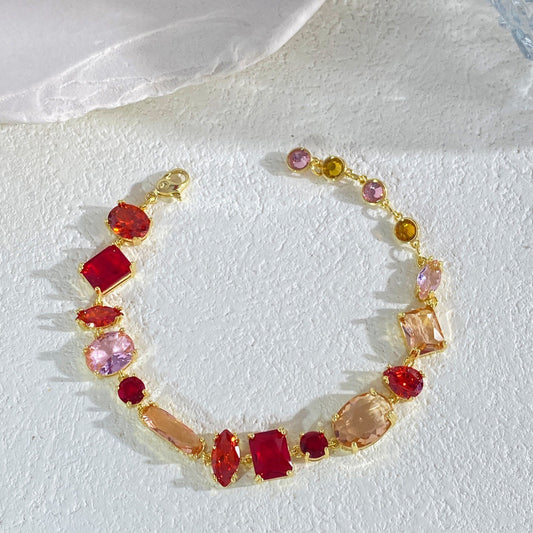 Red crystal and colored diamond bracelet