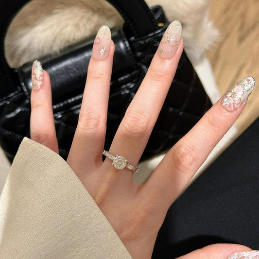 Four-claw moissanite and zircon ring