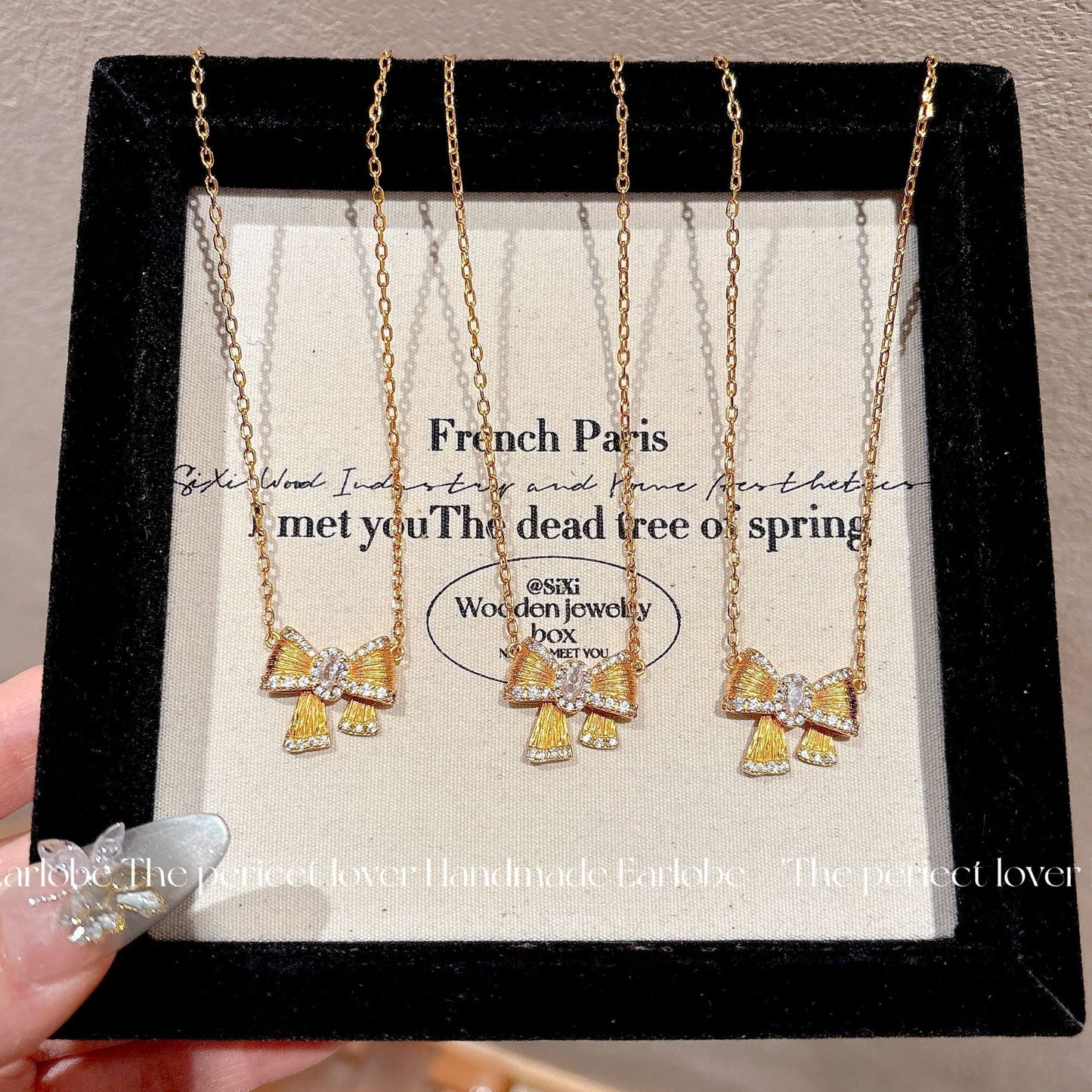 Zircon brushed bow necklace