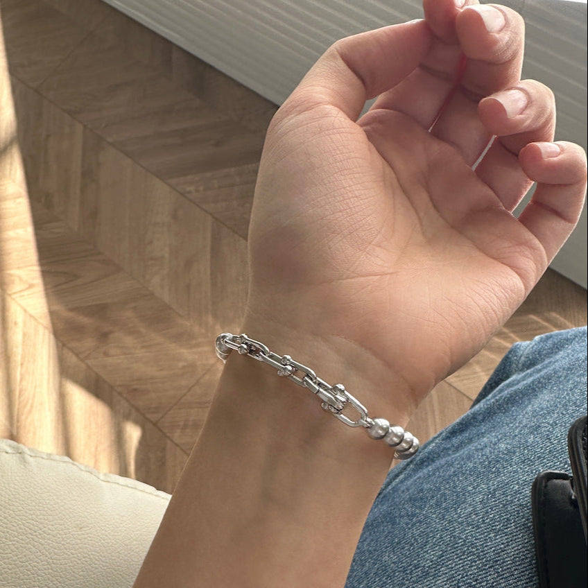 Gray faux pearl and horseshoe clasp bracelet