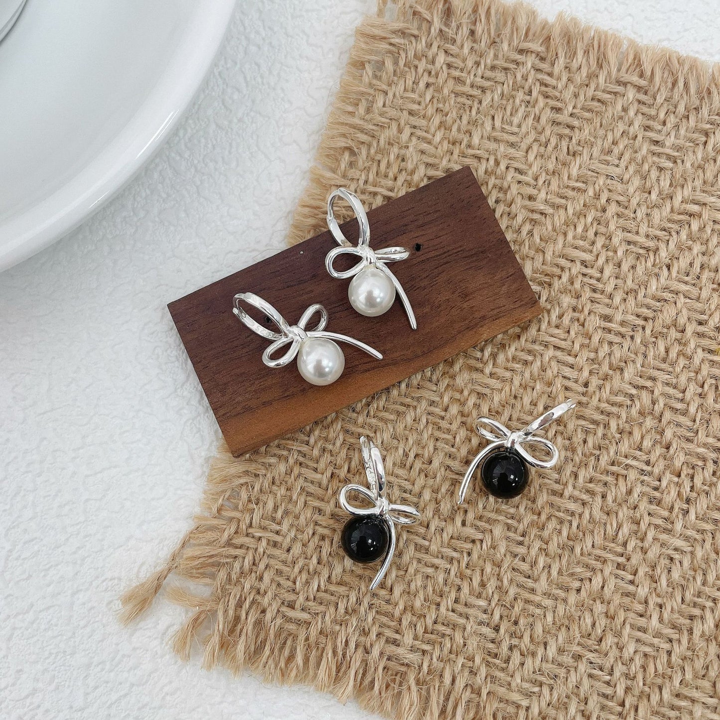 S925 artificial pearl bow earrings
