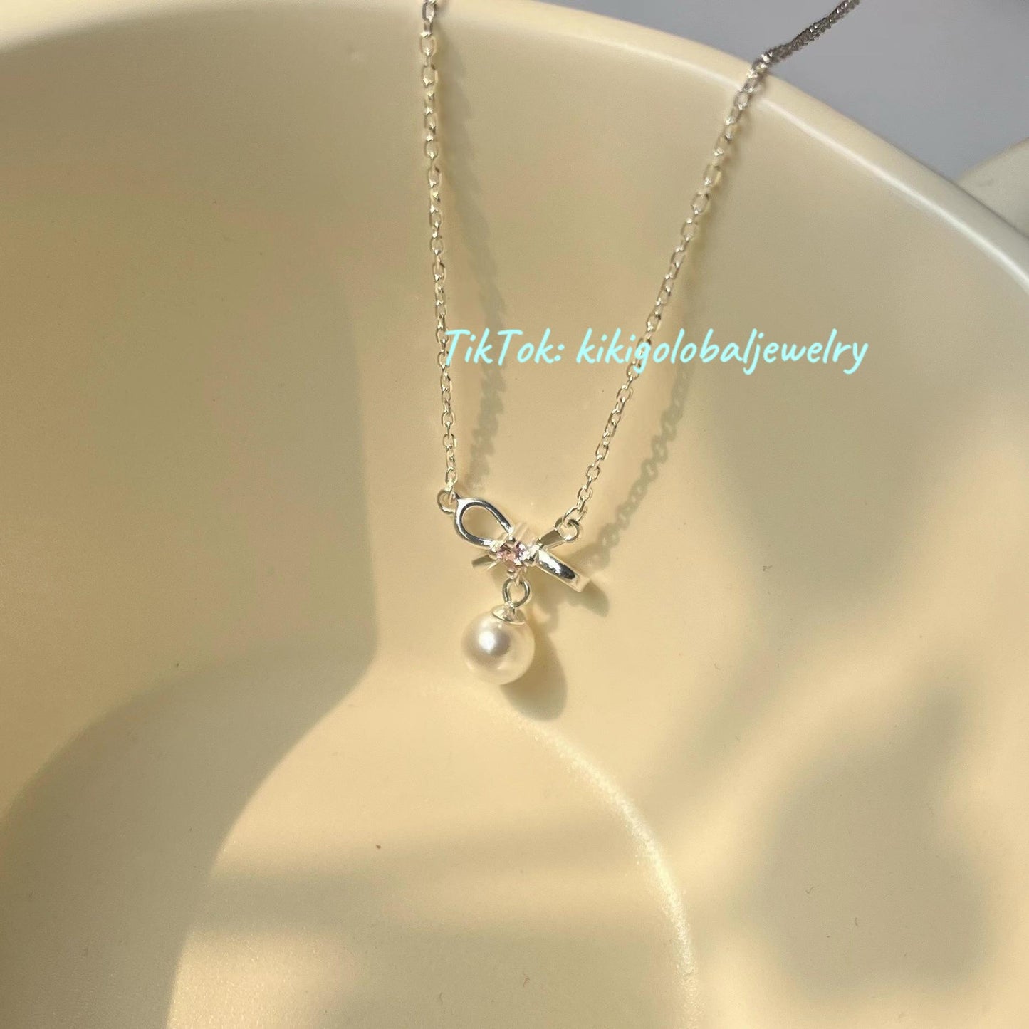S925 sterling silver pink diamond bow pearl necklace