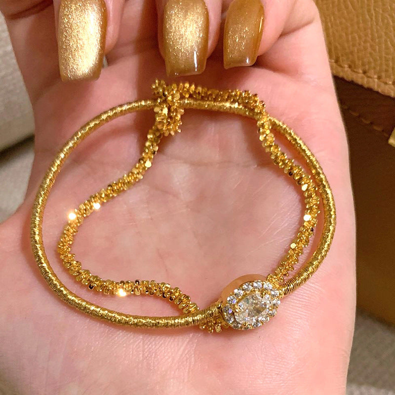Wrapped gold wire bracelet