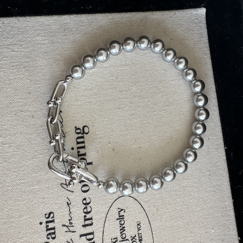 Gray faux pearl and horseshoe clasp bracelet