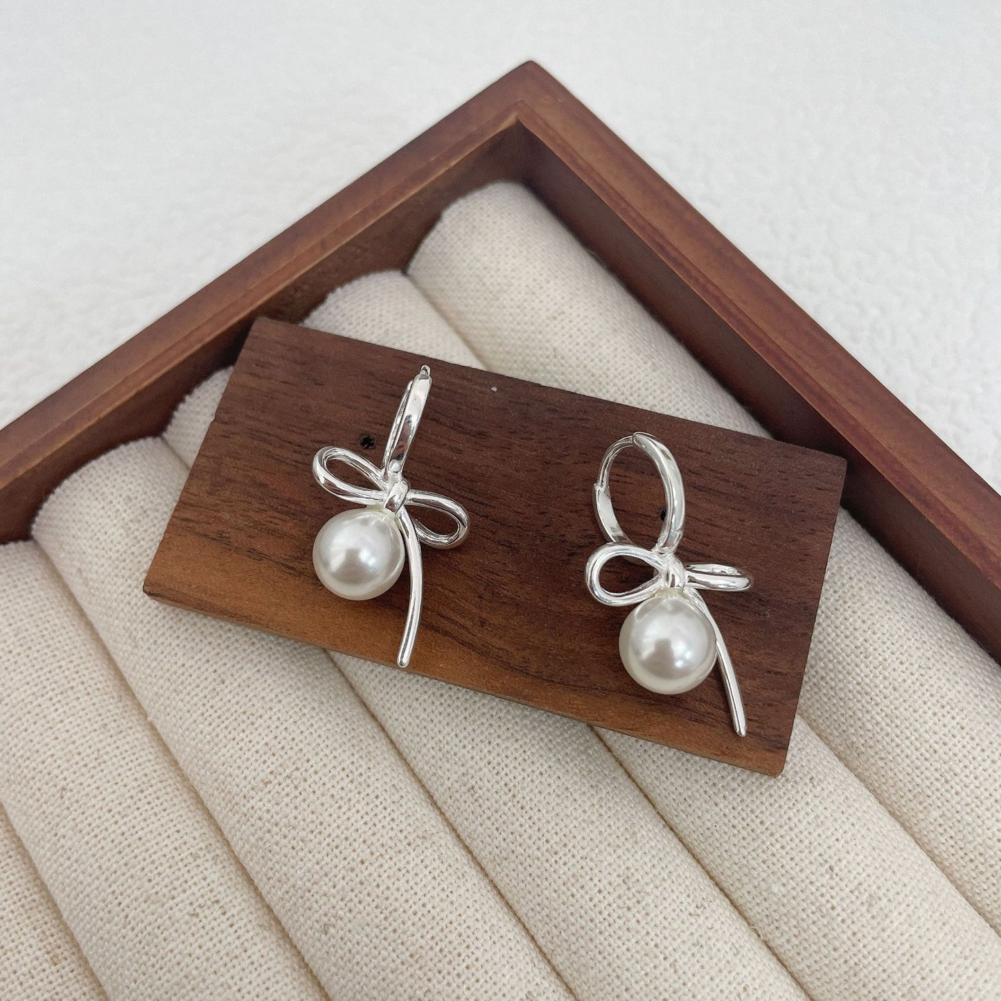 S925 artificial pearl bow earrings